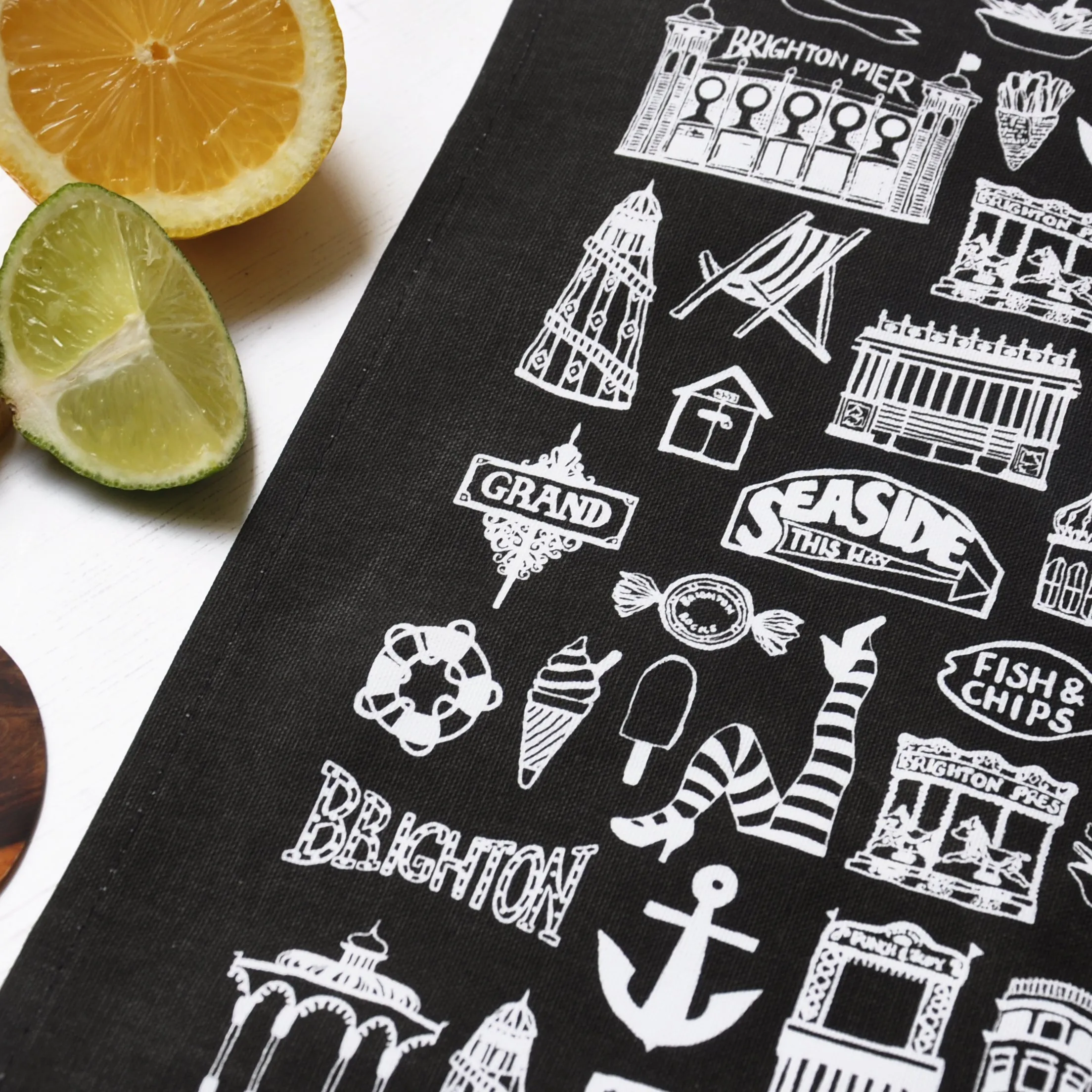 Brighton black illustrated tea towel