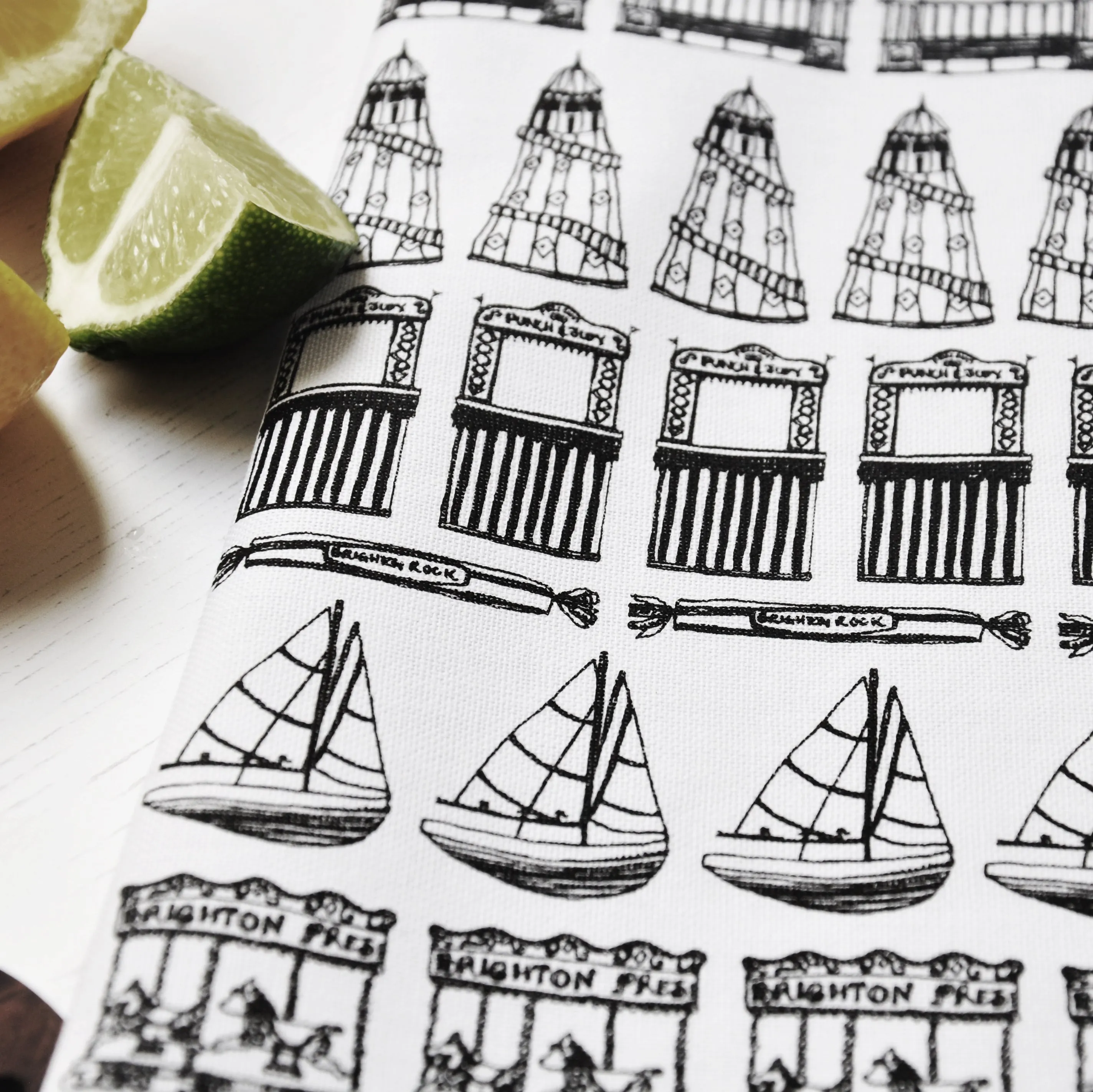 Brighton Row Illustrated Black And White Tea Towel