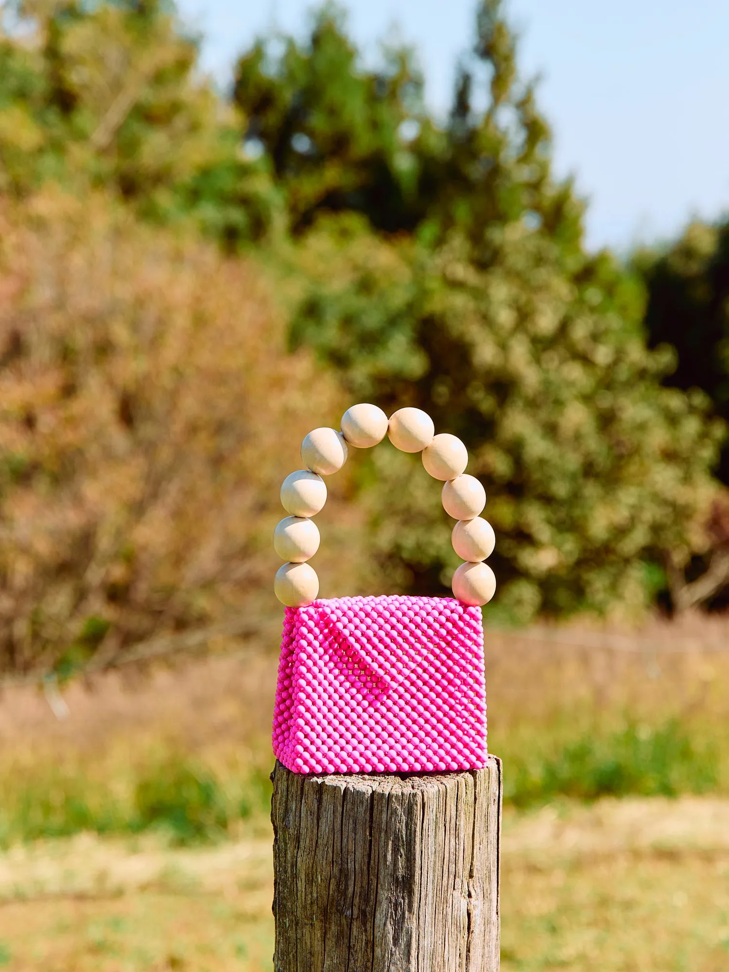 wood ball hand bag（vivid pink）